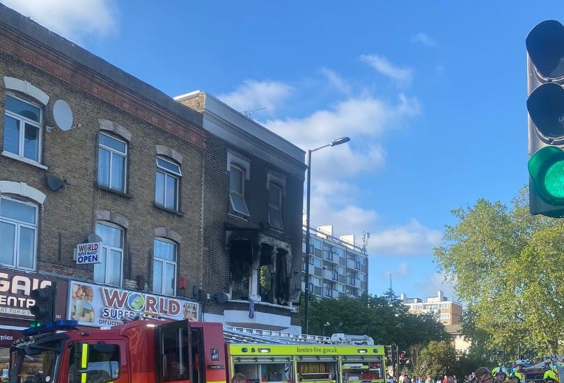 Firefighters at Canning Town flat fire save three children