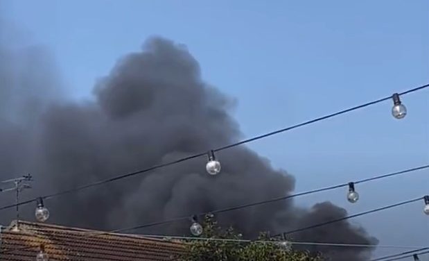 Rainham industrial yard fire produces thick clouds of smoke