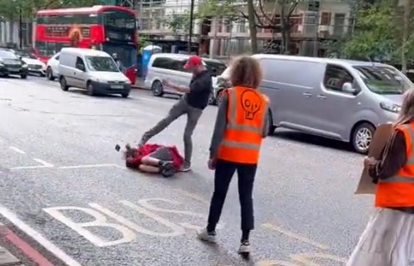 Just Stop Oil protestor punched and kicked by man in car accident