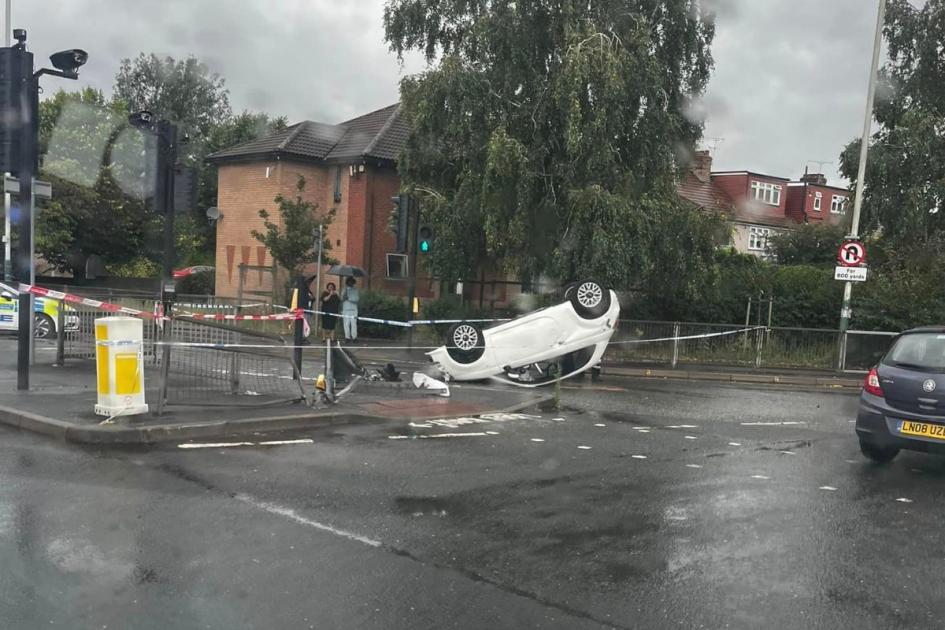 Man injured after car overturns at Roneo Corner, Romford