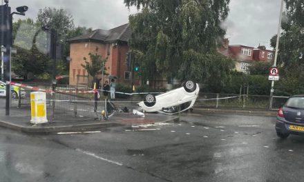 Man injured after car overturns at Roneo Corner, Romford