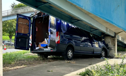 Van damaged after crash into a Romford pedestrian overpass